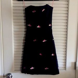 Black strapless Lilypod minidress.